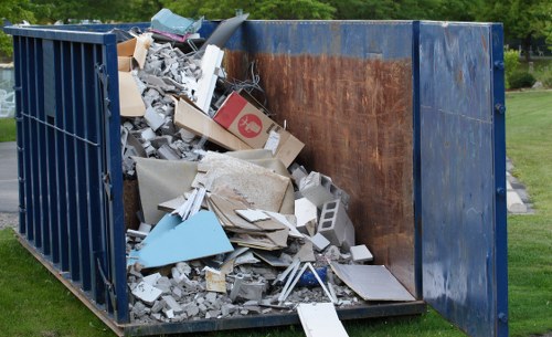 Different types of construction debris ready for disposal