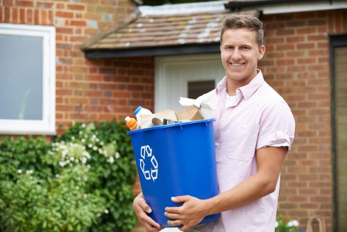 Community members participating in waste disposal initiatives
