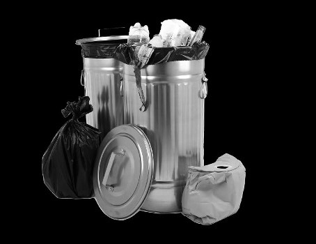 Variety of construction waste materials ready for disposal